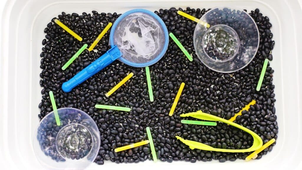 Firefly Catching Sensory Bin hero.